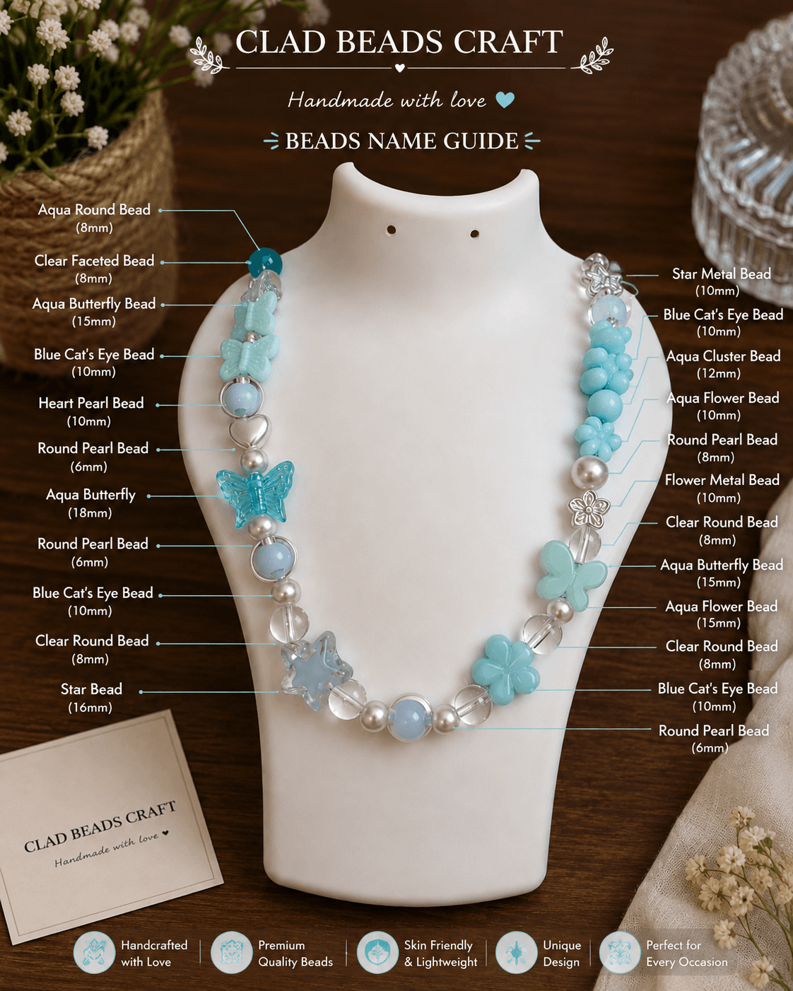 Aqua blue beaded necklace displayed on a jewellery bust with butterfly, flower, clear, round and white decorative bead details.