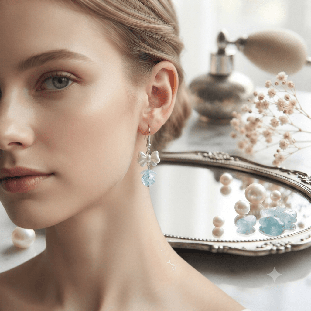 Woman wearing handmade white bow and light-blue beaded dangle earrings with textured blue glass bead details.