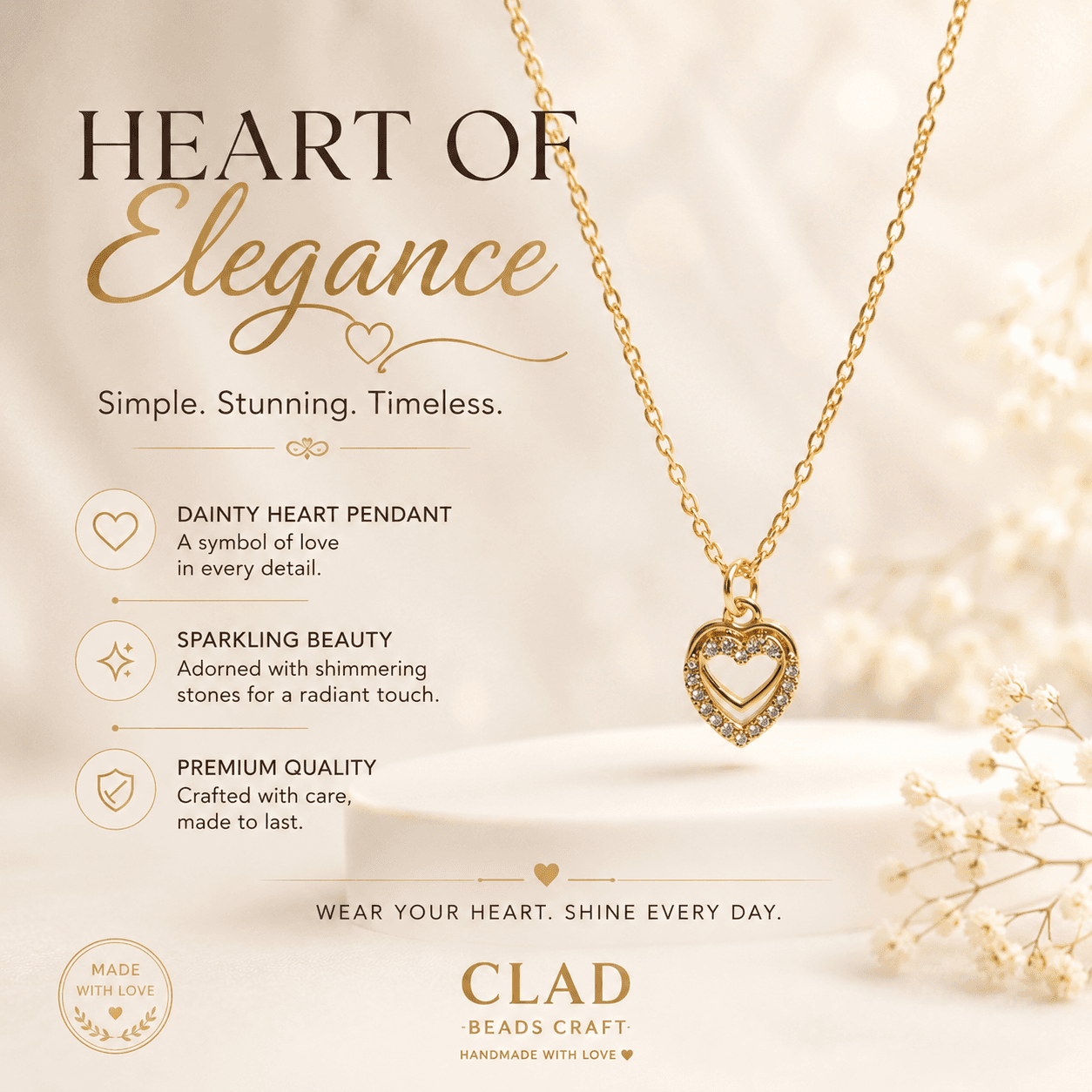 Gold-tone heart pendant necklace with decorative sparkle-style detailing