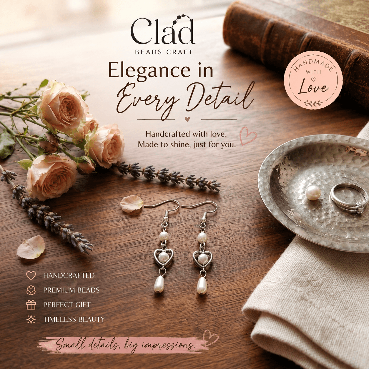 Pearl-look heart drop earrings displayed with Clad Beads Craft branding and handmade jewellery presentation
